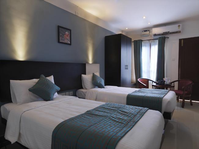 Aquarock Hotel Kazhakuttam Kamer foto